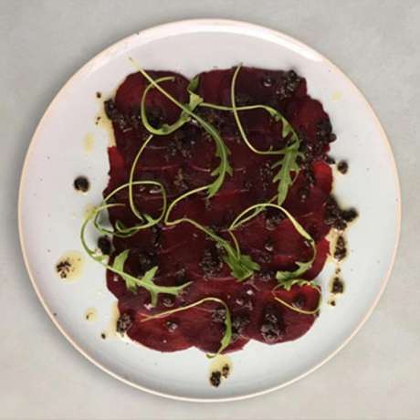 Recipe Carpaccio of red beetroot with black tapenade dressing